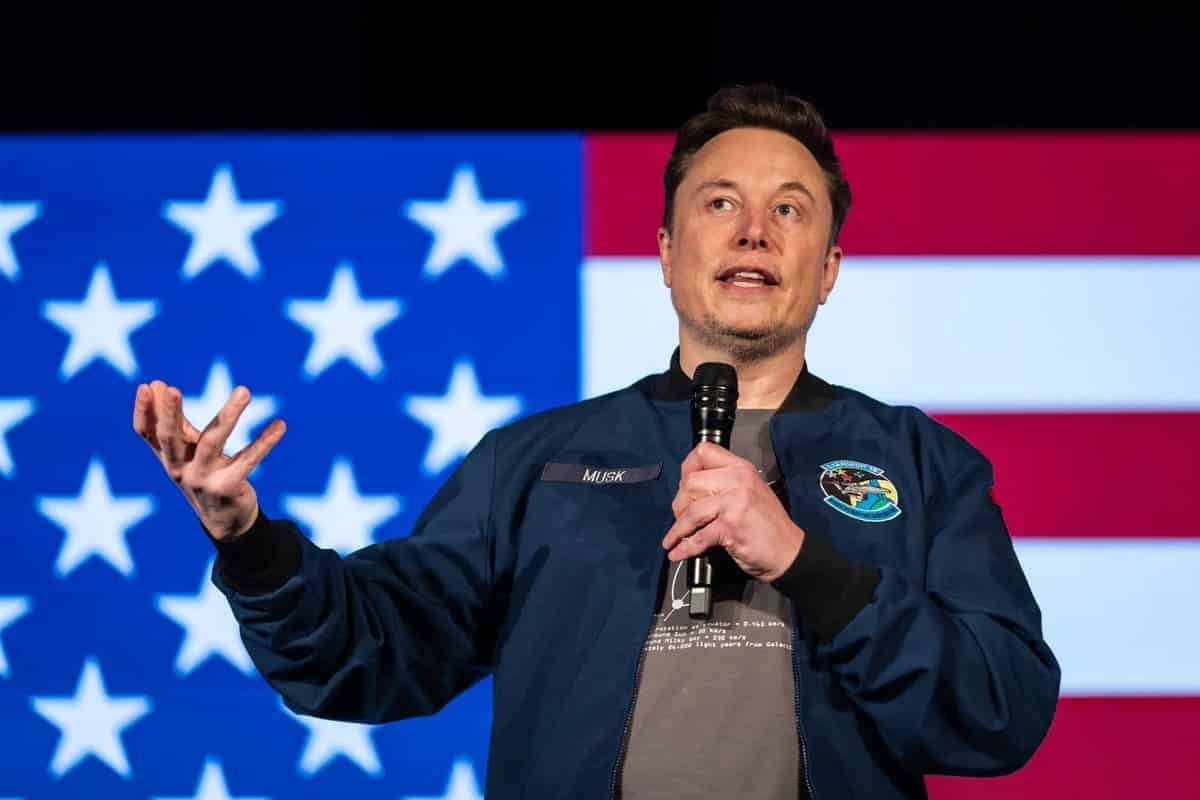 Elon Musk with Tesla Gigafactory